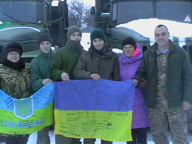 Волонтери передали військовим прапор та ікону